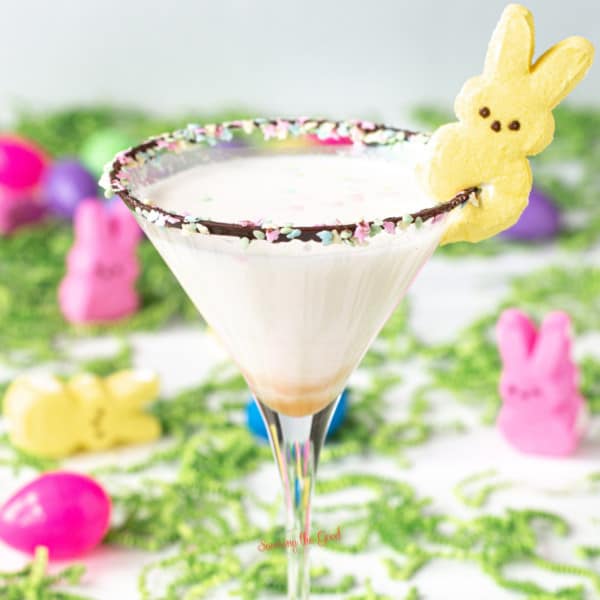easter cocktail with marshmallow peep garnish.