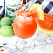 rum punch recipe with garnishes, square image.