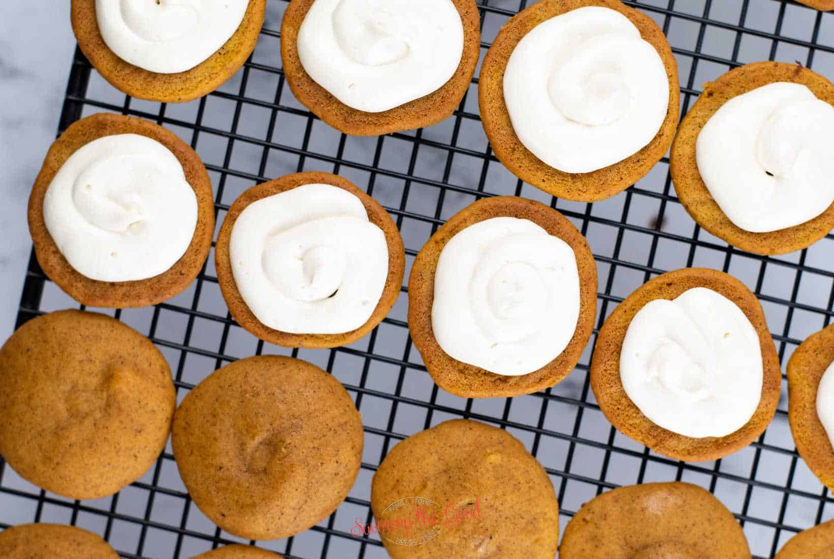 pumpkin whoopie pie shells filled with filling.