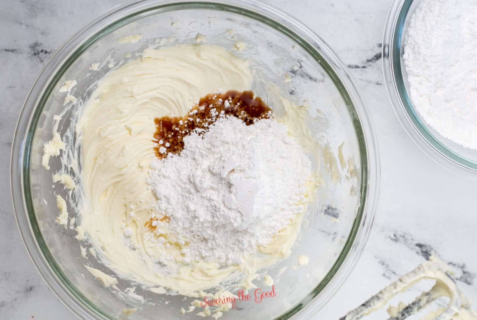 vanilla and part of the powdered sugar added to the cream cheese and butter mixture.