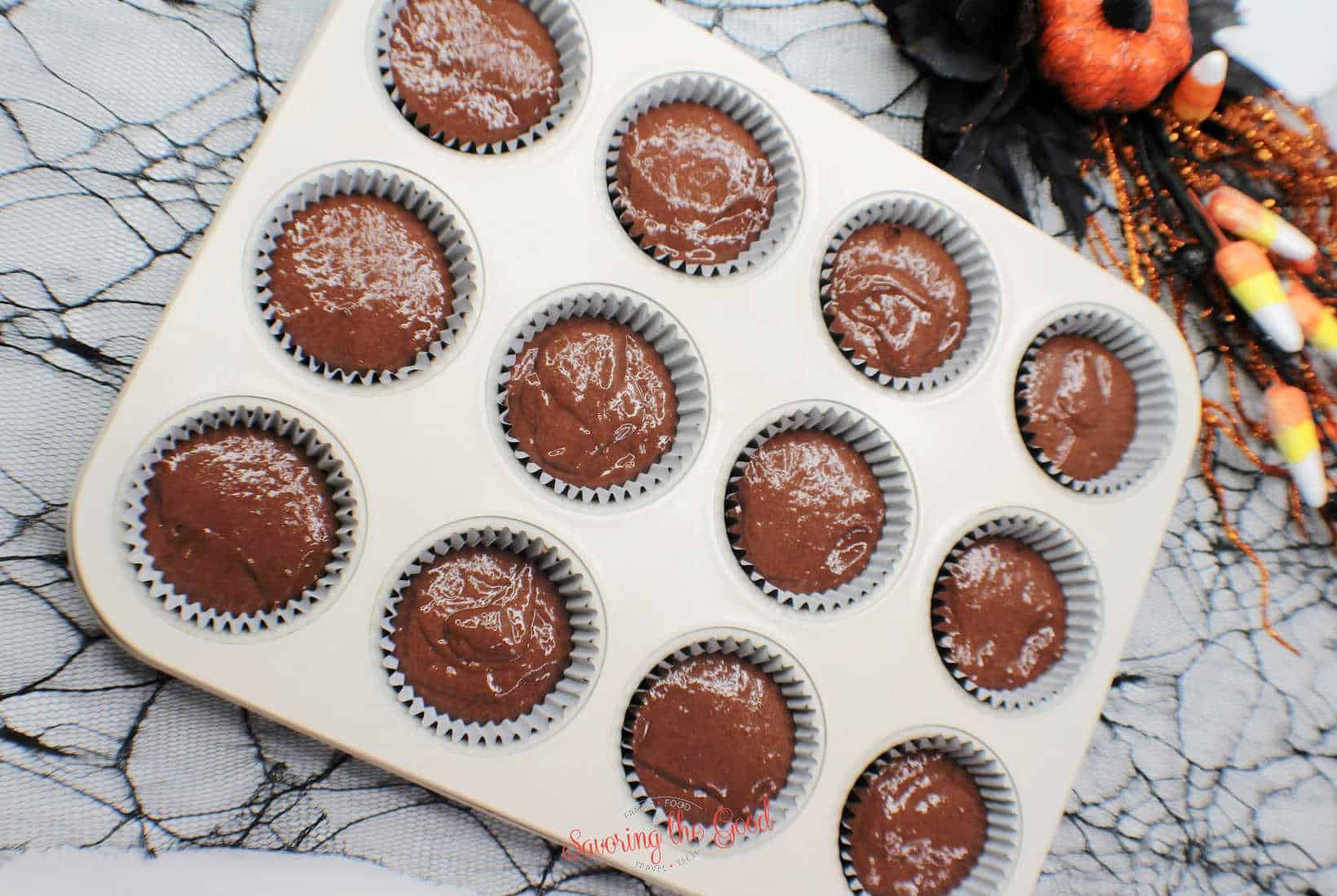 chocolate cupcake batter in pan.