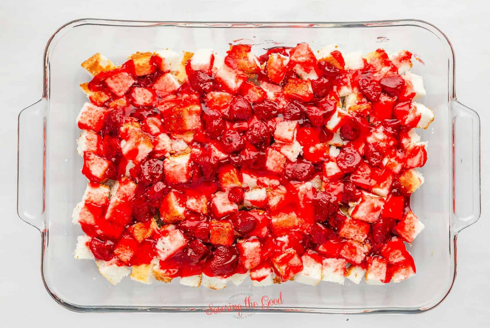 strawberry filling over cubes of angel food cake.