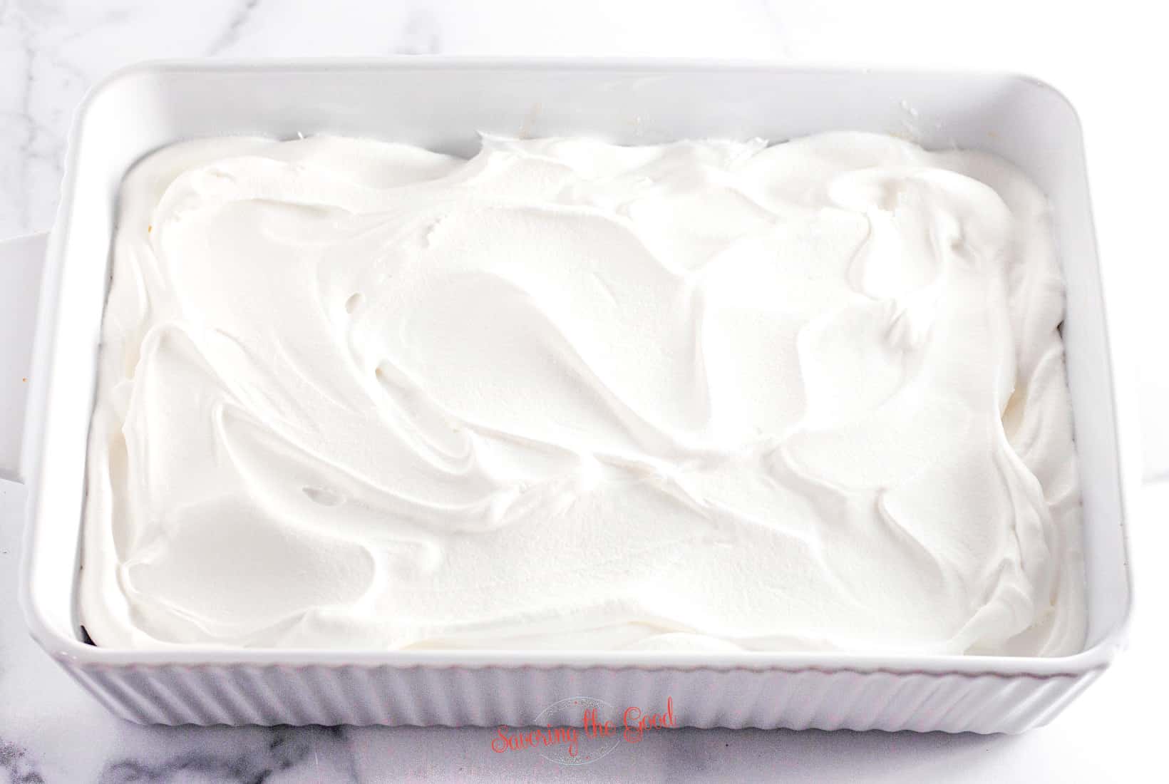 cool whip added to the pan.