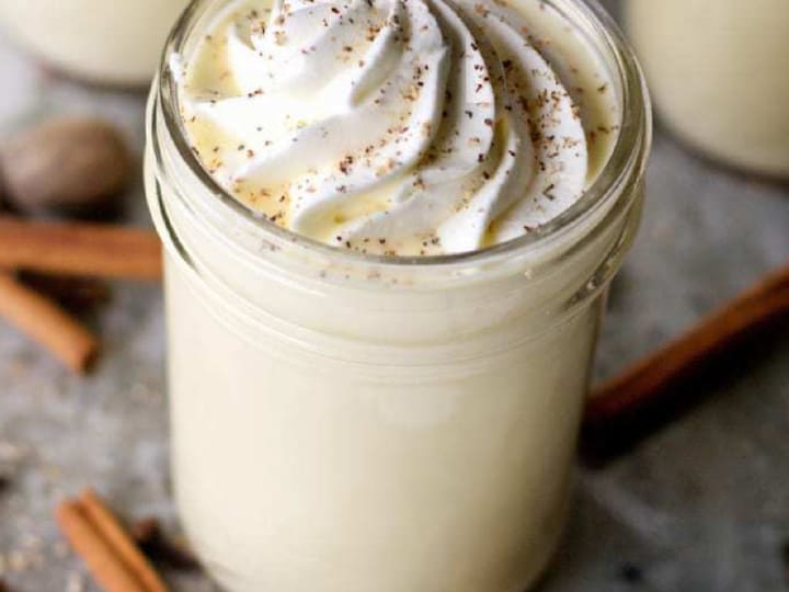 sous vide eggnog with whipped cream square image.