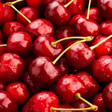 A close up image of a bunch of cherries.