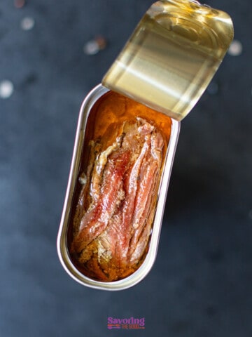 anchovies in a tin, tin open as the featured image of anchovy paste substitute.