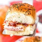 turkey hawaiian roll slider on a spatula