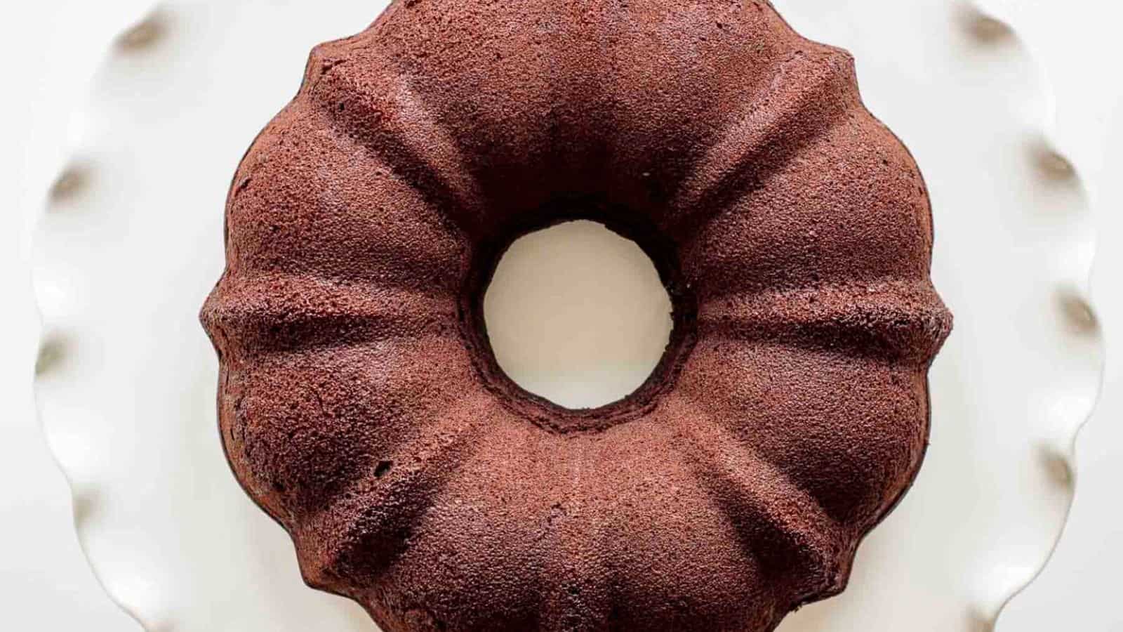 A chocolate sourdough discard cake with a hole in the middle.