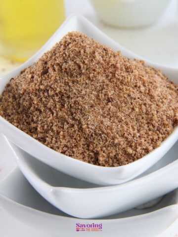 A bowl of Chinese 5 spice substitute sprinkled on top of a bowl.