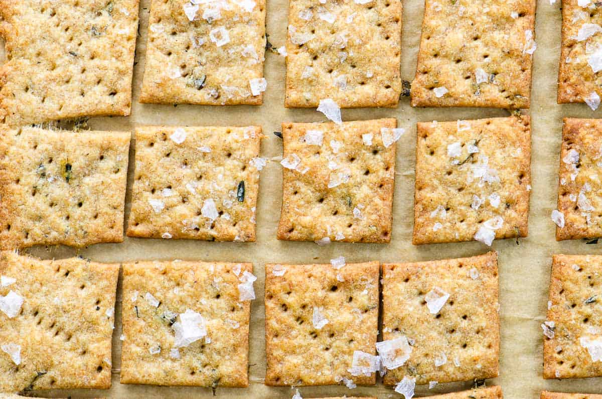A sheet of crackers on a baking sheet.
