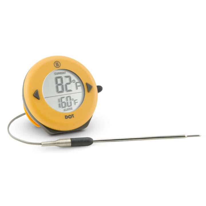 Digital meat thermometer with an orange casing, perfect for candy making, displaying a current temperature of 82°F and an alarm set for 160°F-a versatile cooking tool.