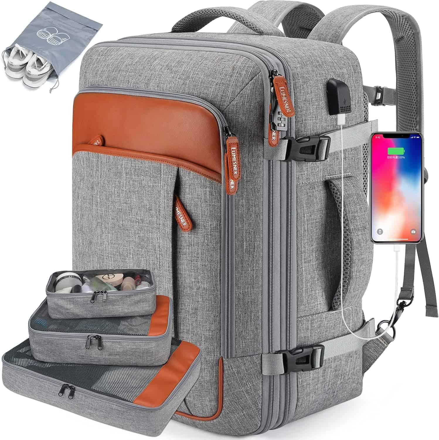 Gray travel backpack with brown accents, USB charging port, multiple compartments, packing cubes, and a separate shoe bag. A phone charges on the sideโperfect for Father's Day gifts for dads who love to travel in style and stay organized.