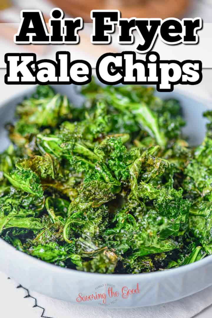 A bowl of crispy kale chips is placed on a table. Large text above reads "Delicious Air Fryer Kale Chips.
