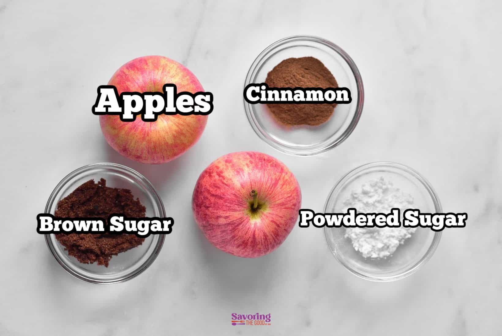 Image of three apples positioned next to small bowls containing cinnamon, powdered sugar, and brown sugar, arranged on a white marble surface. Text labels are present above each item, evoking the perfect ingredients for making air fried apple chips.