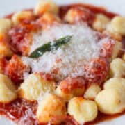 Ricotta gnudi are dumplings of ricotta cheese, flour, egg yolk and salt, similar to their cousin gnocchi but made with ricotta cheese instead of potato.