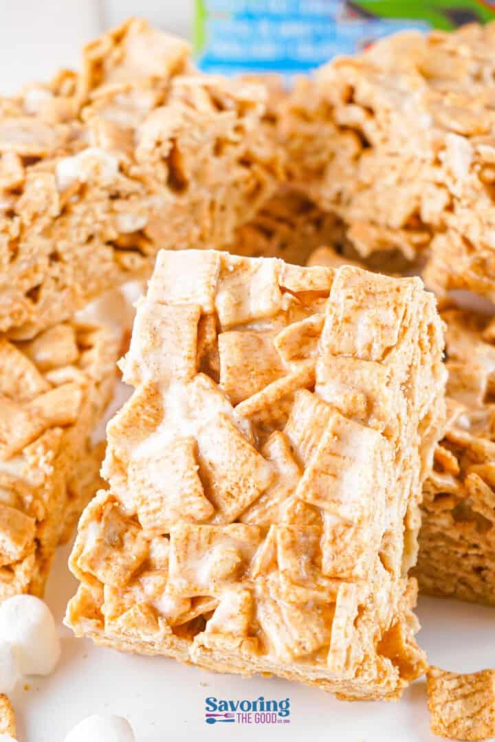 Close-up of Cinnamon Toast Crunch Bars made with square-shaped cereal pieces and gooey marshmallows.