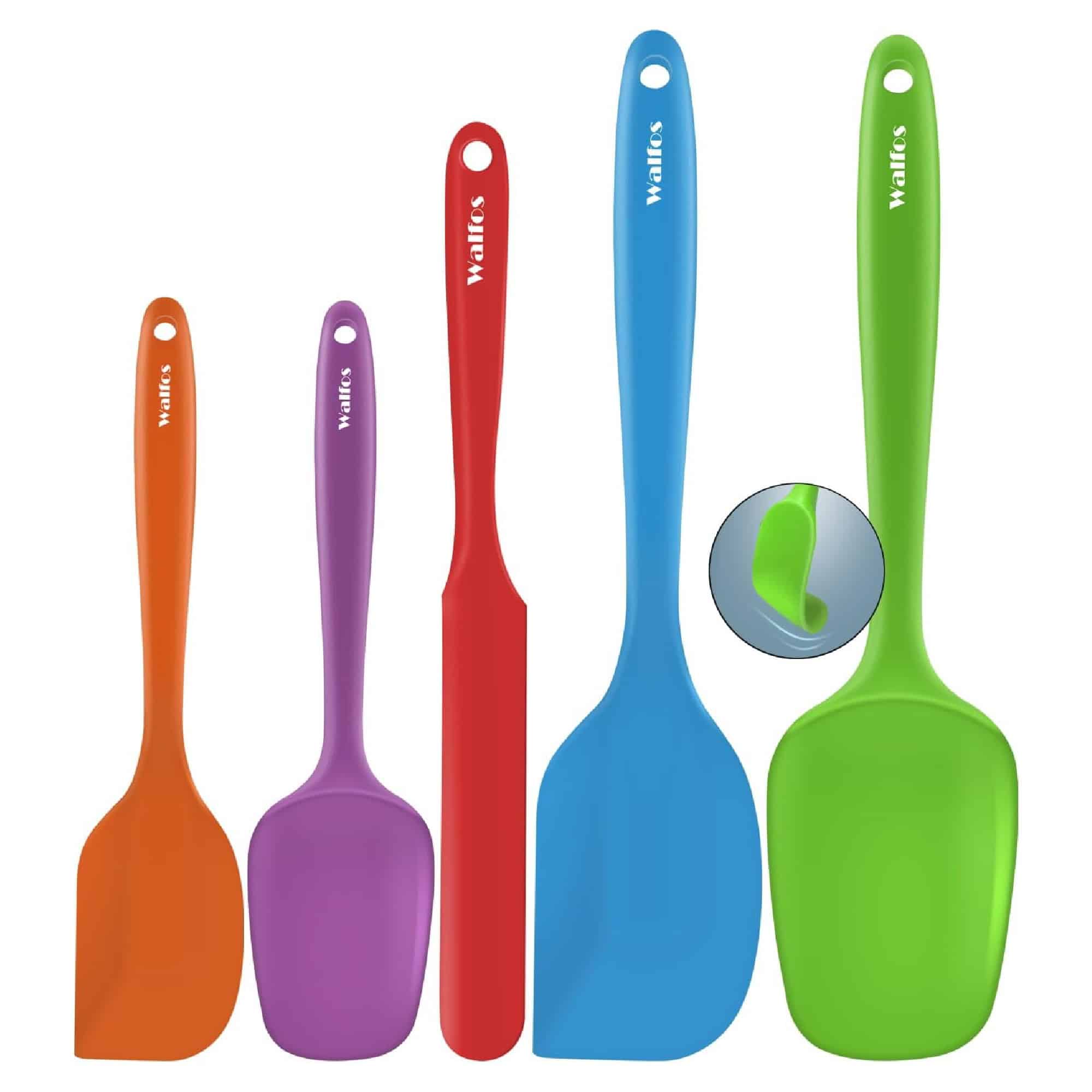 Set of five colorful silicone spatulas in orange, purple, red, blue, and green, with a close-up of the green spatula's tip.