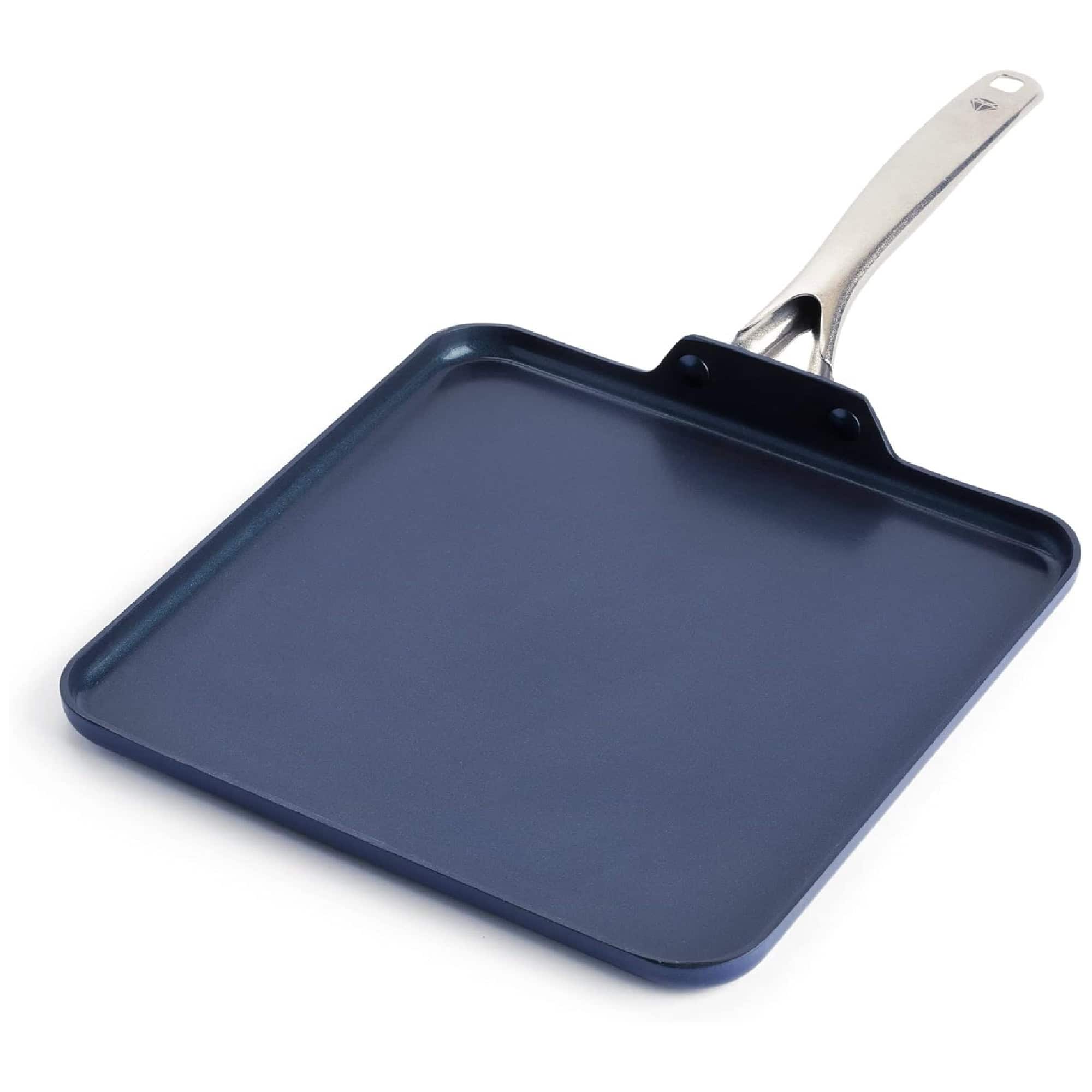 A square, blue nonstick griddle pan with a silver handle on a white background.
