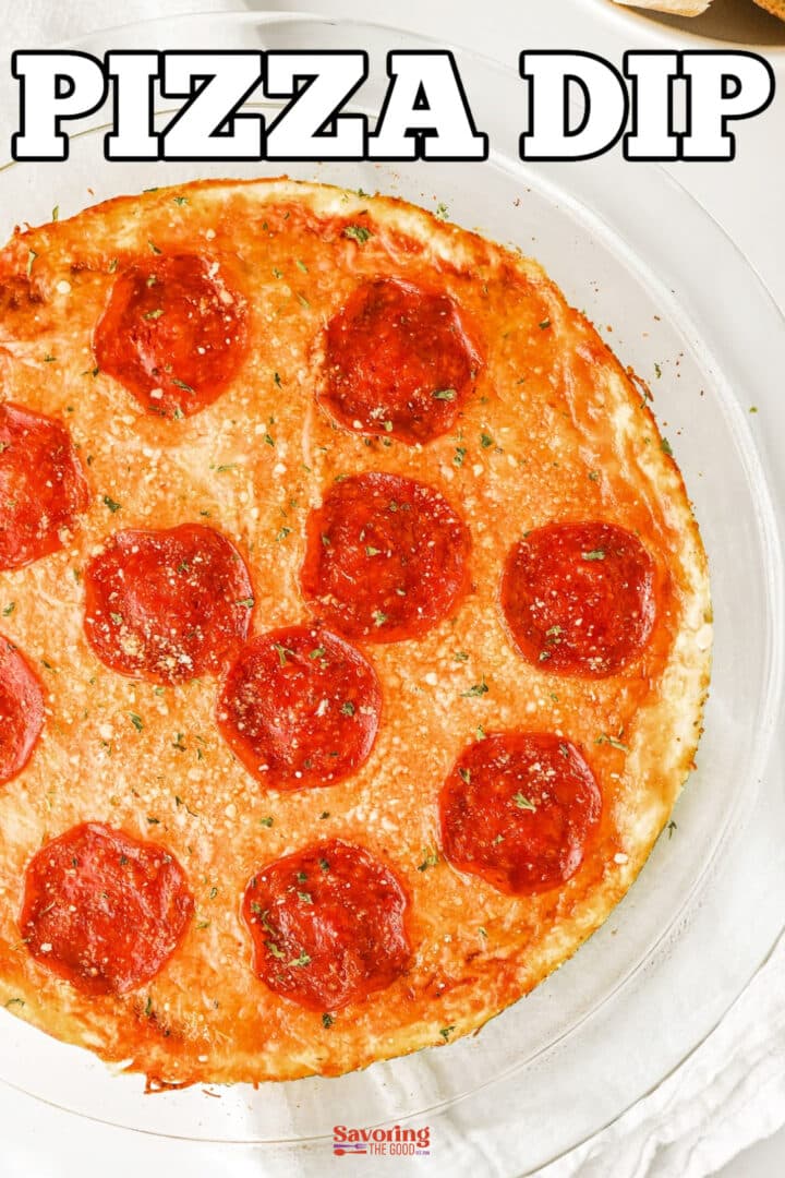 A round glass dish filled with pizza dip topped with melted cheese and pepperoni slices, with "PIZZA DIP" in large text above.